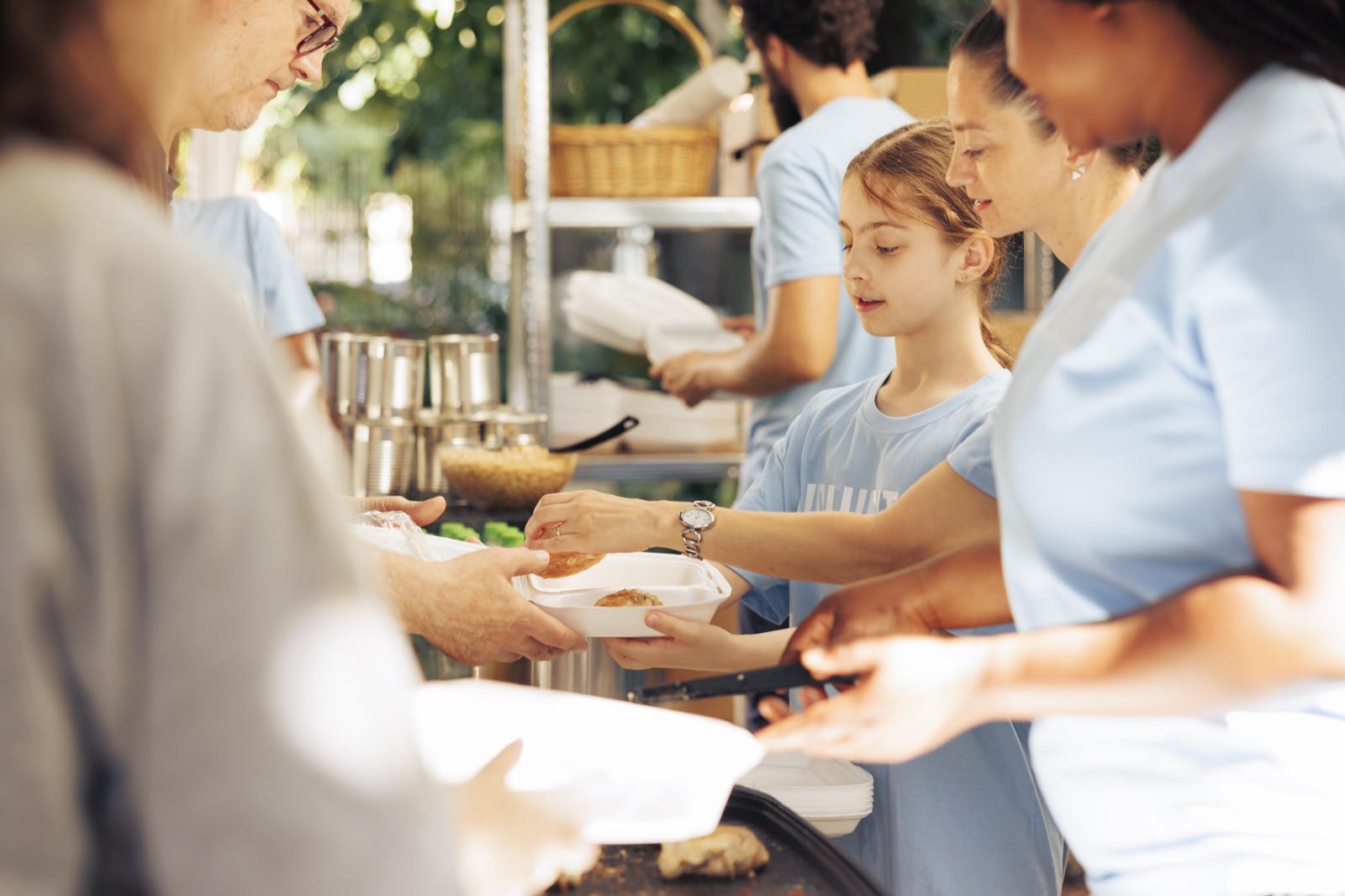 Hilston Park team serving food at an outdoor event